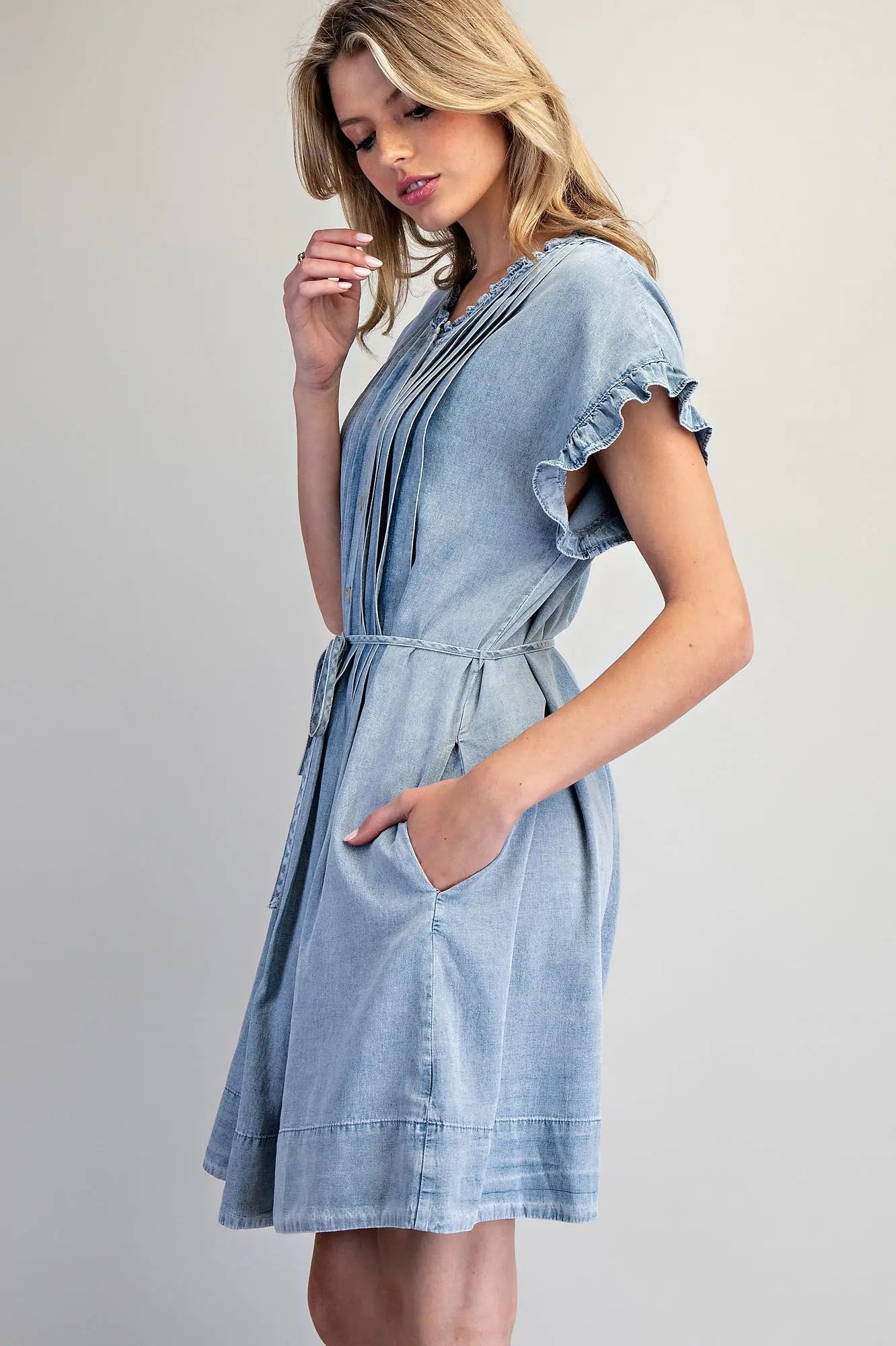 Snow washed pleated denim mini dress with tie waist