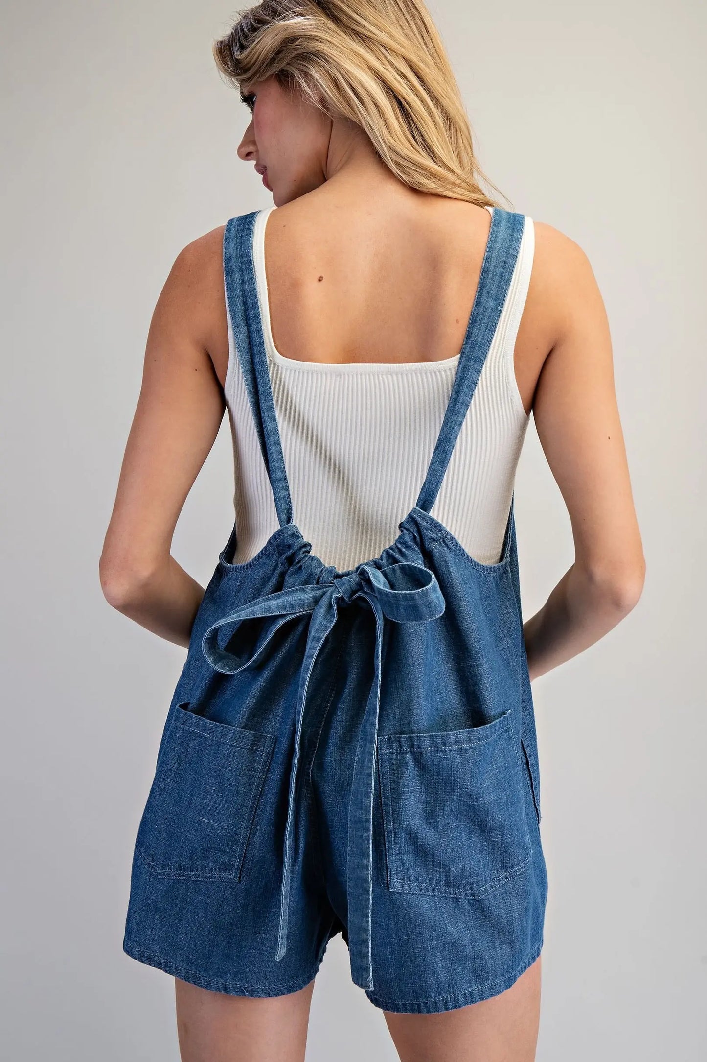 The Madison Denim Tie-Back Romper