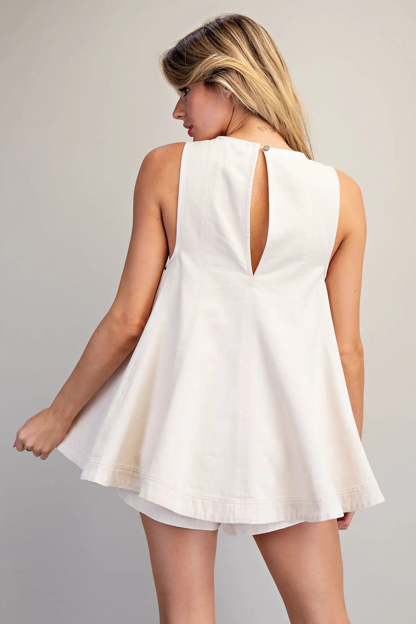 Women’s swing style sleeveless blouse with keyhole back