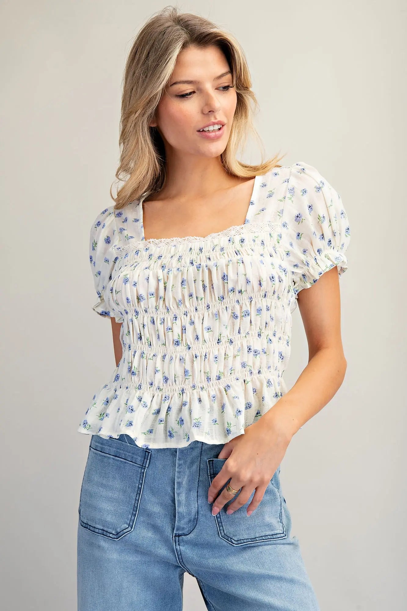 Floral print smocked peplum blouse