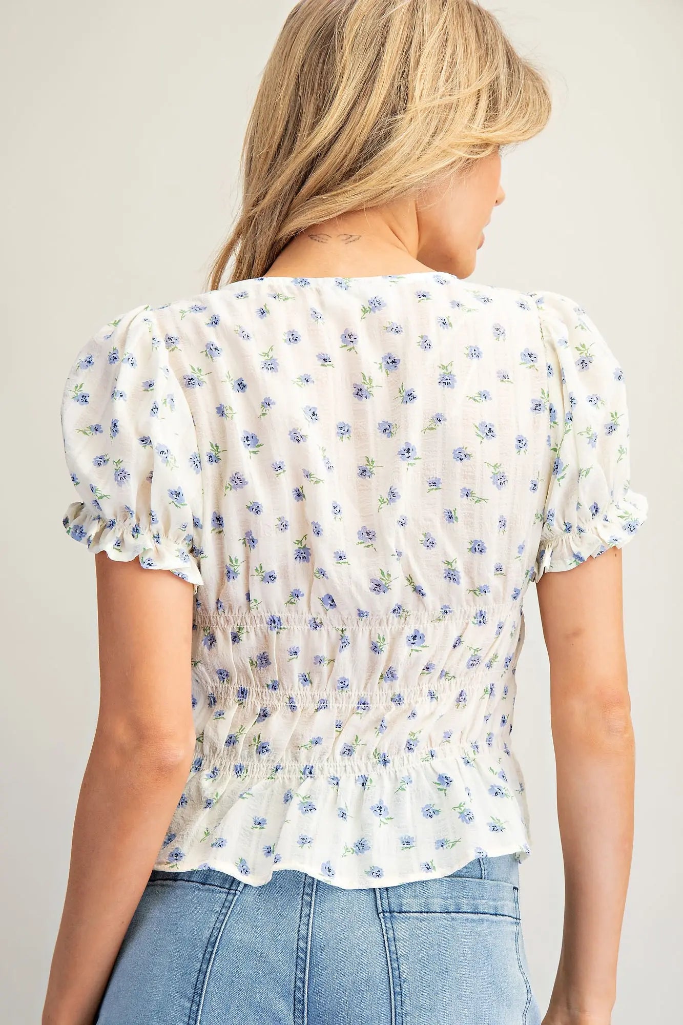 Floral print smocked peplum blouse