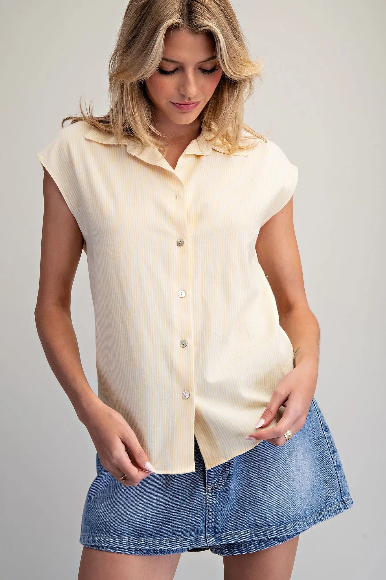 Striped button down blouse with cinch tie back