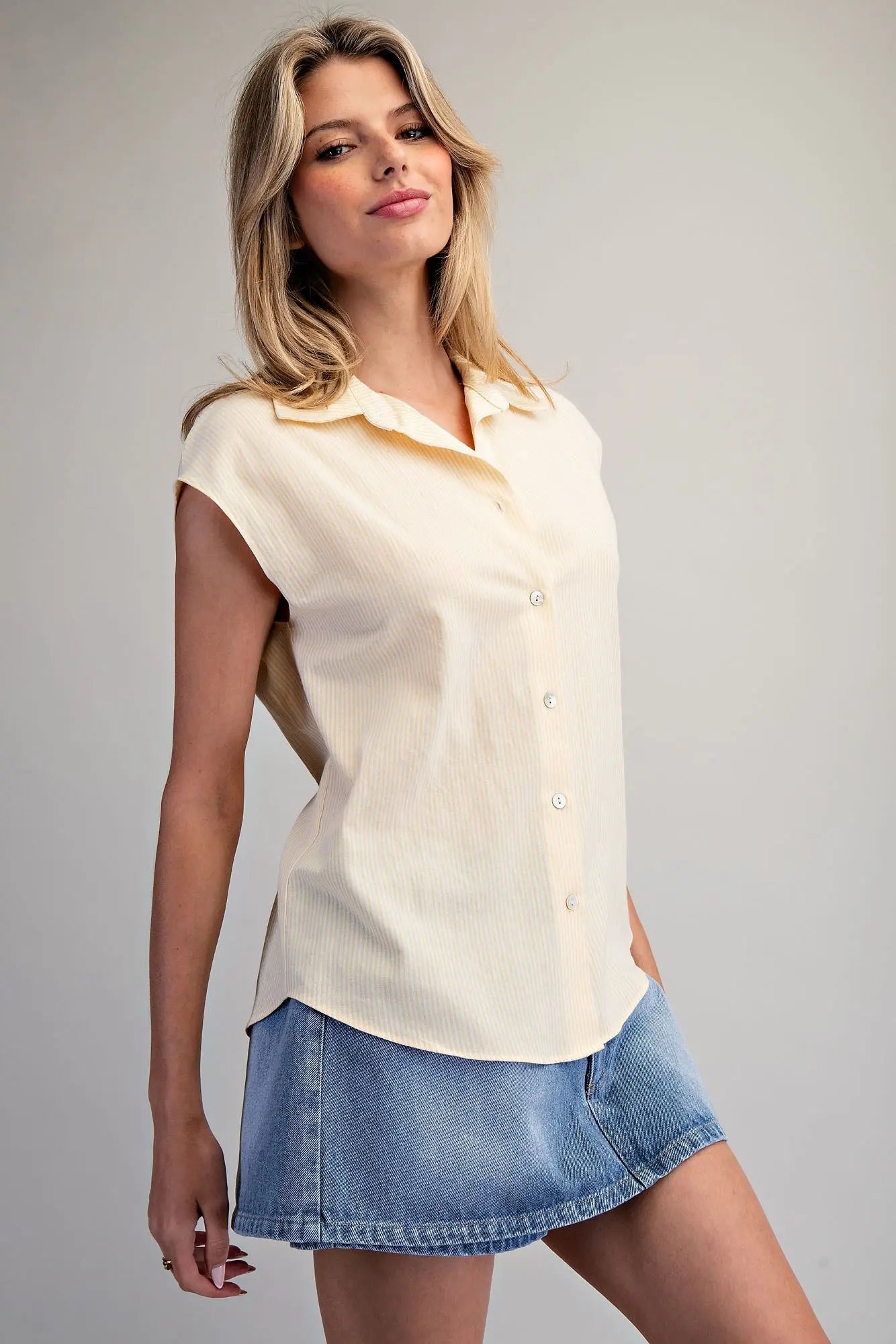 Striped button down blouse with cinch tie back