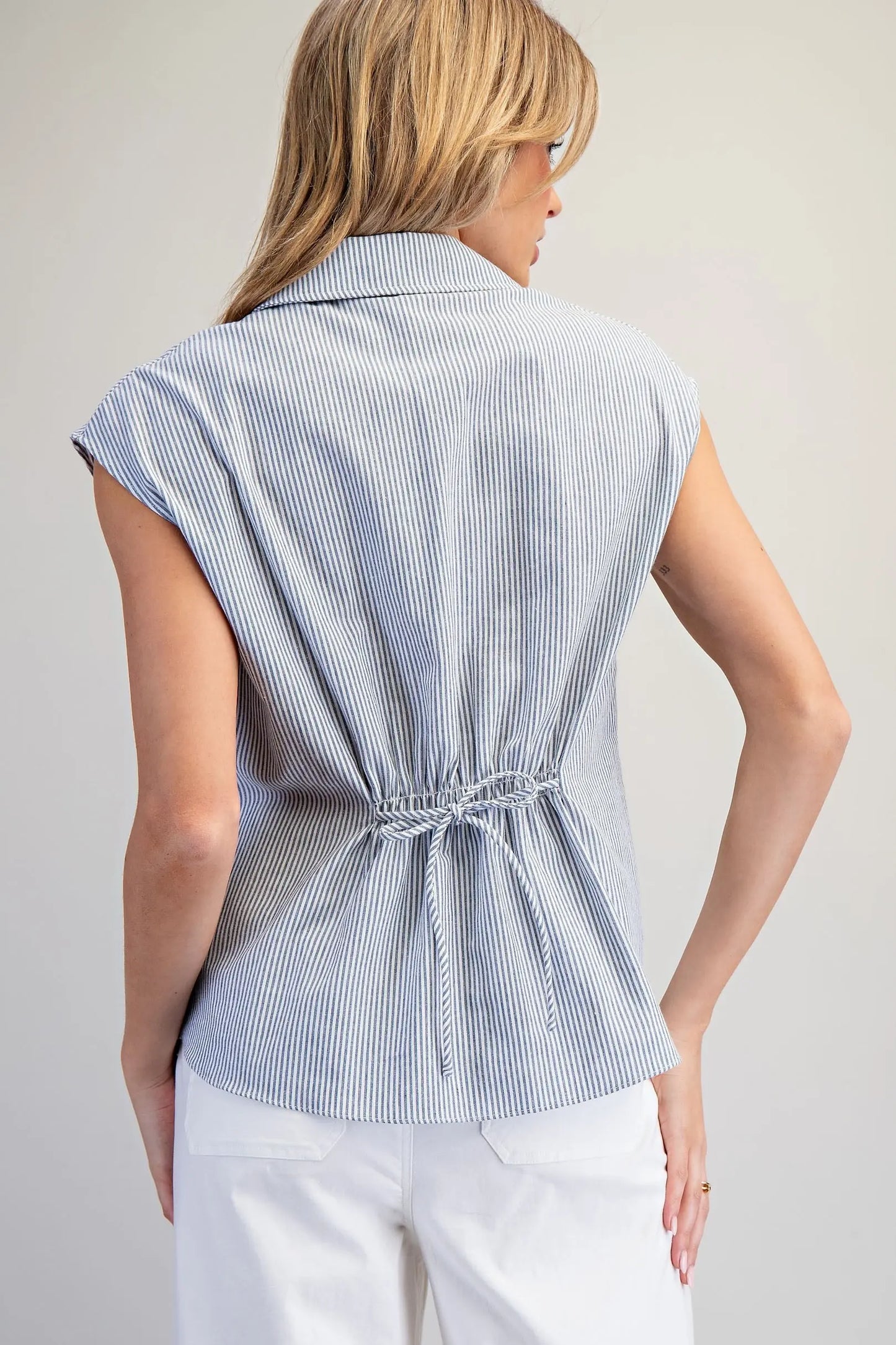 Striped button down blouse with cinch tie back