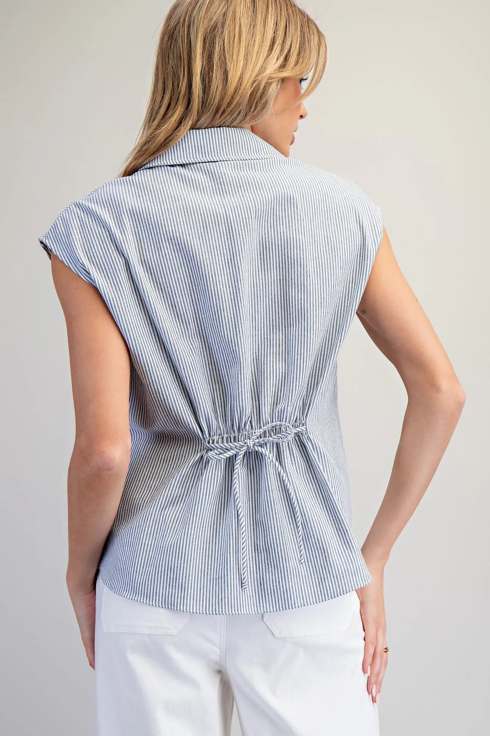 Striped button down blouse with cinch tie back