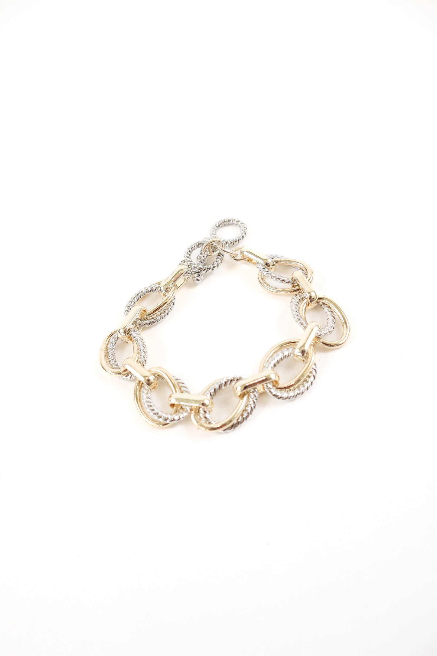 Mixed metal gold and silver oversized link statement bracelet, women’s boutique chain jewelry.