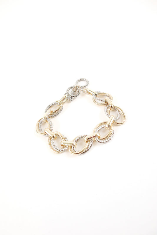 Mixed metal gold and silver oversized link statement bracelet, women’s boutique chain jewelry.