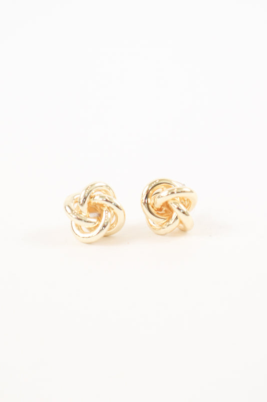 Gold knot stud earrings with polished finish, women’s boutique classic statement jewelry.