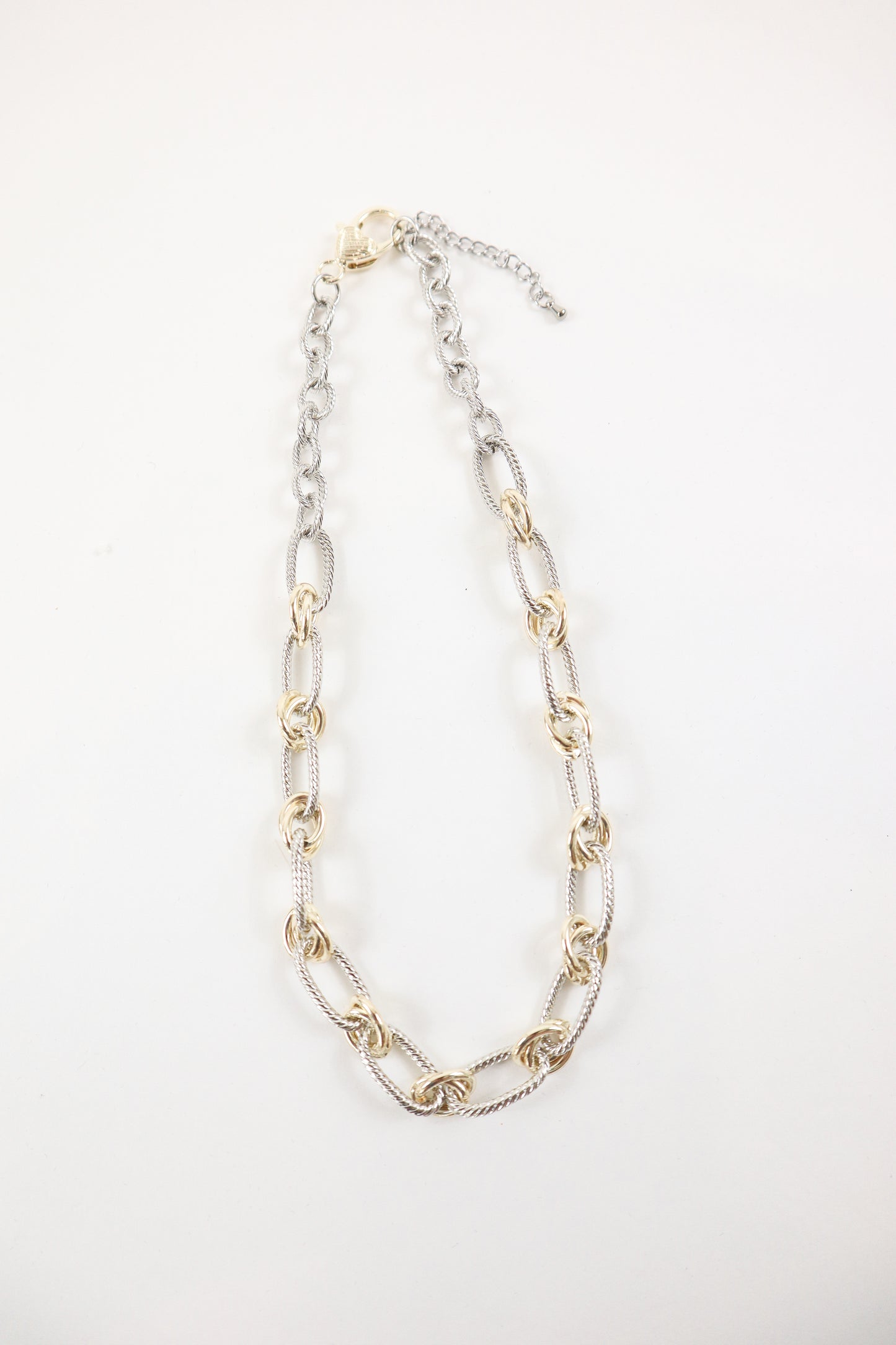 Mixed metal rope link necklace with gold connectors, women’s boutique statement chain jewelry.