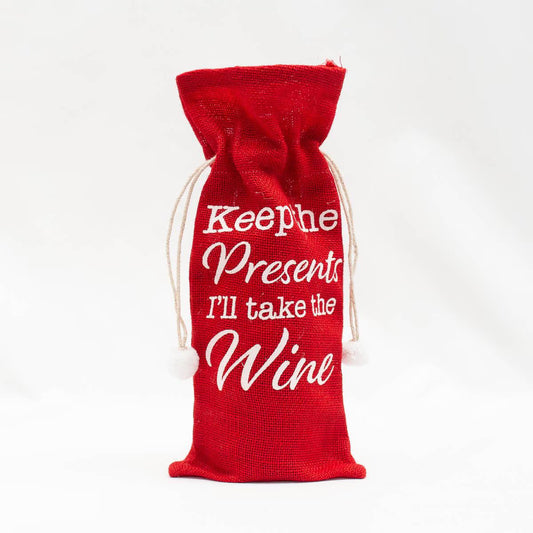 This canvas wine gift bag features the phrase "Keep the presents, I'll take the wine."