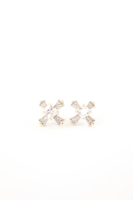 Gold and silver pavé cross stud earrings with round crystal center stone, women’s boutique statement jewelry.