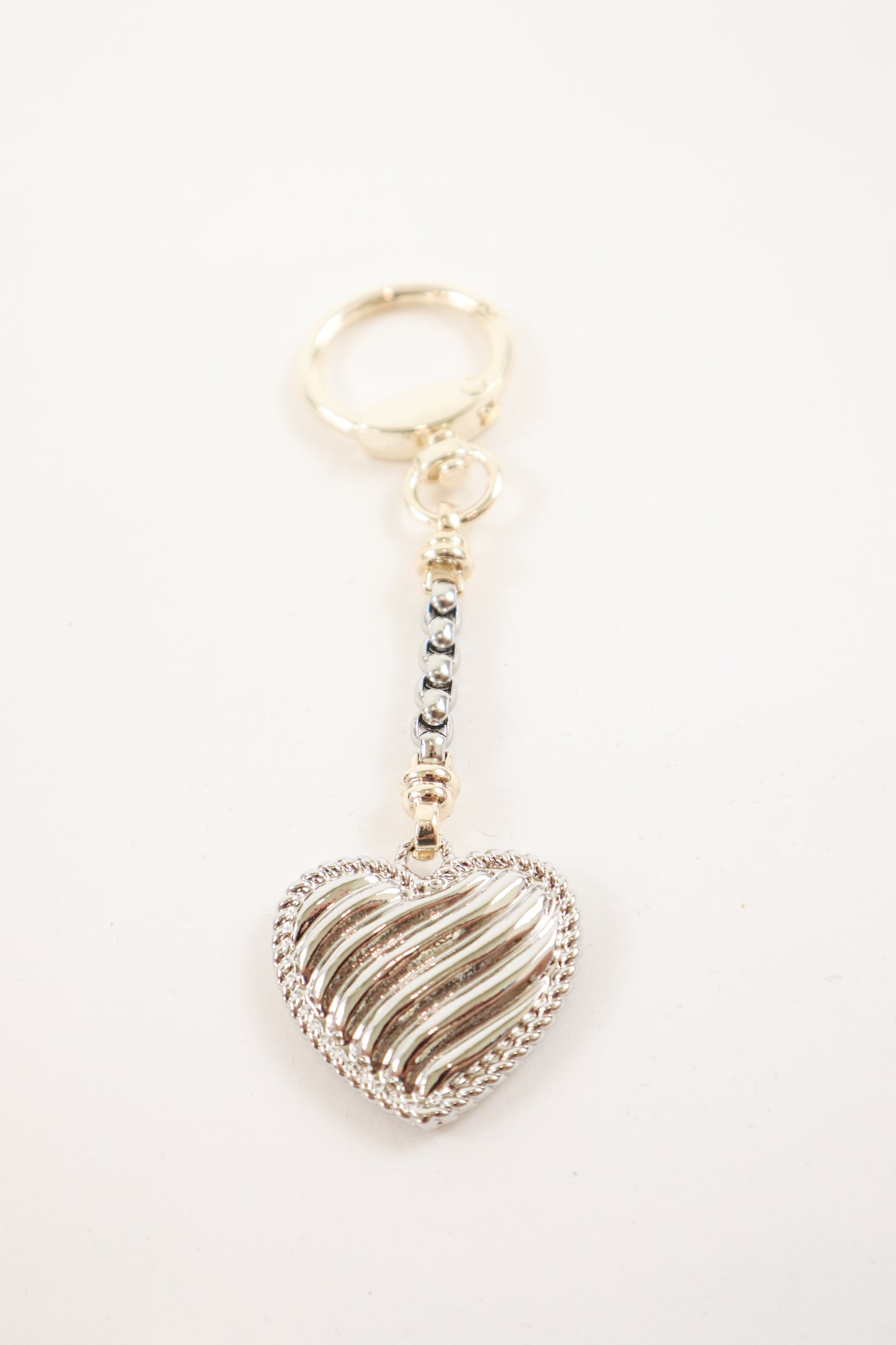keychain with textured detailing and rope edge