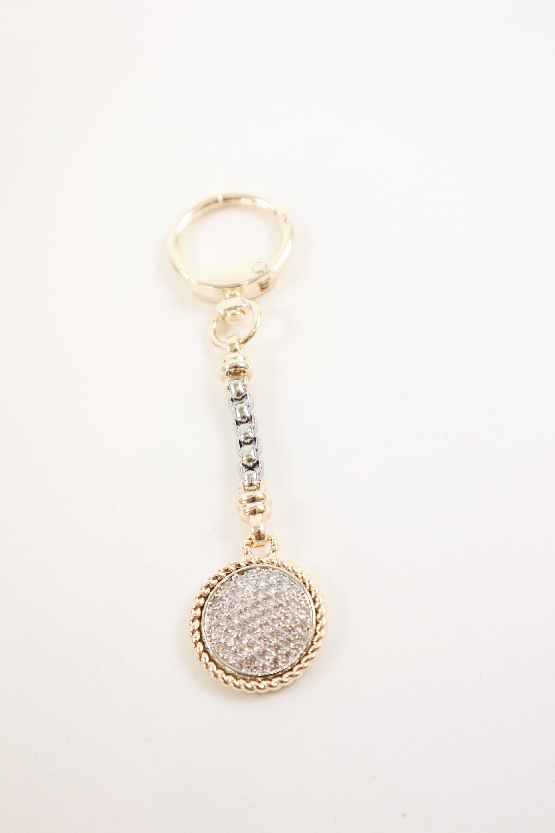 keychain with textured detailing and rope edge