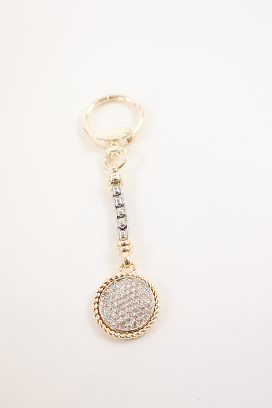 keychain with textured detailing and rope edge