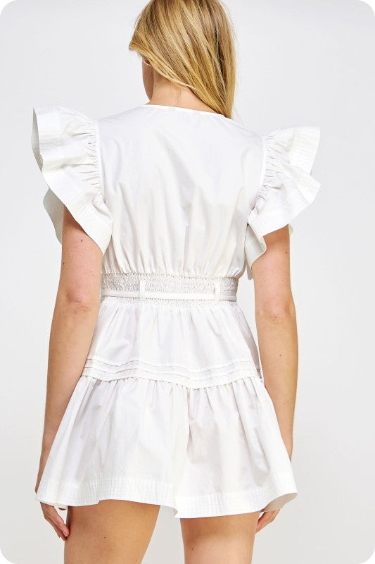feminine cotton poplin mini dress with flutter sleeves, a babydoll silhouette, and a flattering cinched waist.