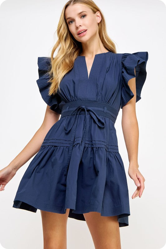 feminine cotton poplin mini dress with flutter sleeves, a babydoll silhouette, and a flattering cinched waist.