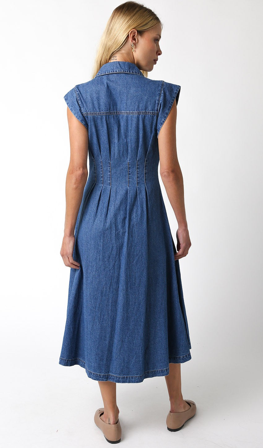 A timeless denim dress with a flattering V-neckline and button-down front for effortless everyday style.
