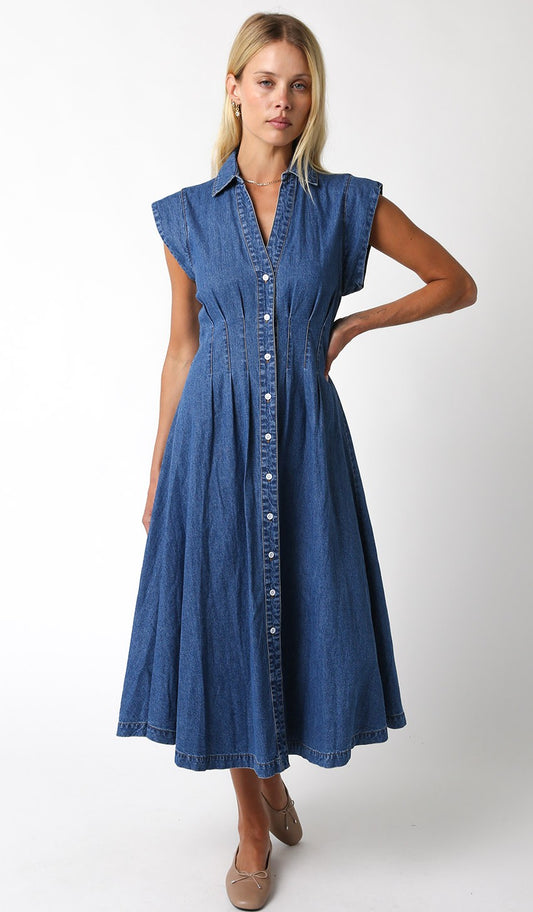 A timeless denim dress with a flattering V-neckline and button-down front for effortless everyday style.