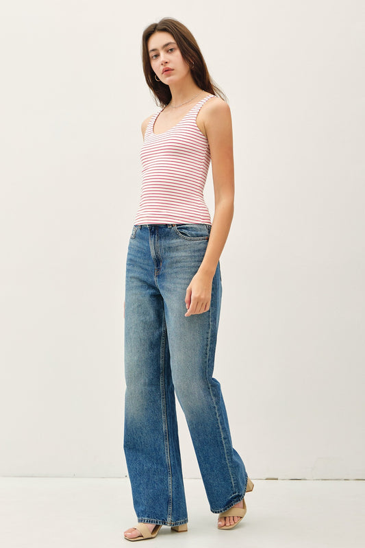 An ultra-soft, double-lined striped tank featuring a flattering scoop neck and back—your new go-to basic for layering or warm-weather styling.