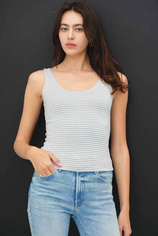 An ultra-soft, double-lined striped tank featuring a flattering scoop neck and back—your new go-to basic for layering or warm-weather styling.