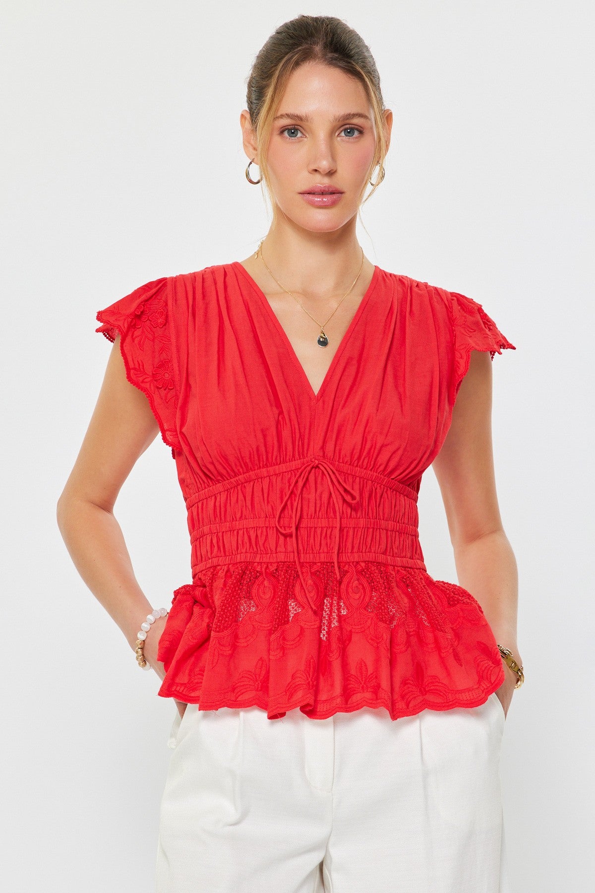 embroidered cotton peplum blouse with flutter sleeves