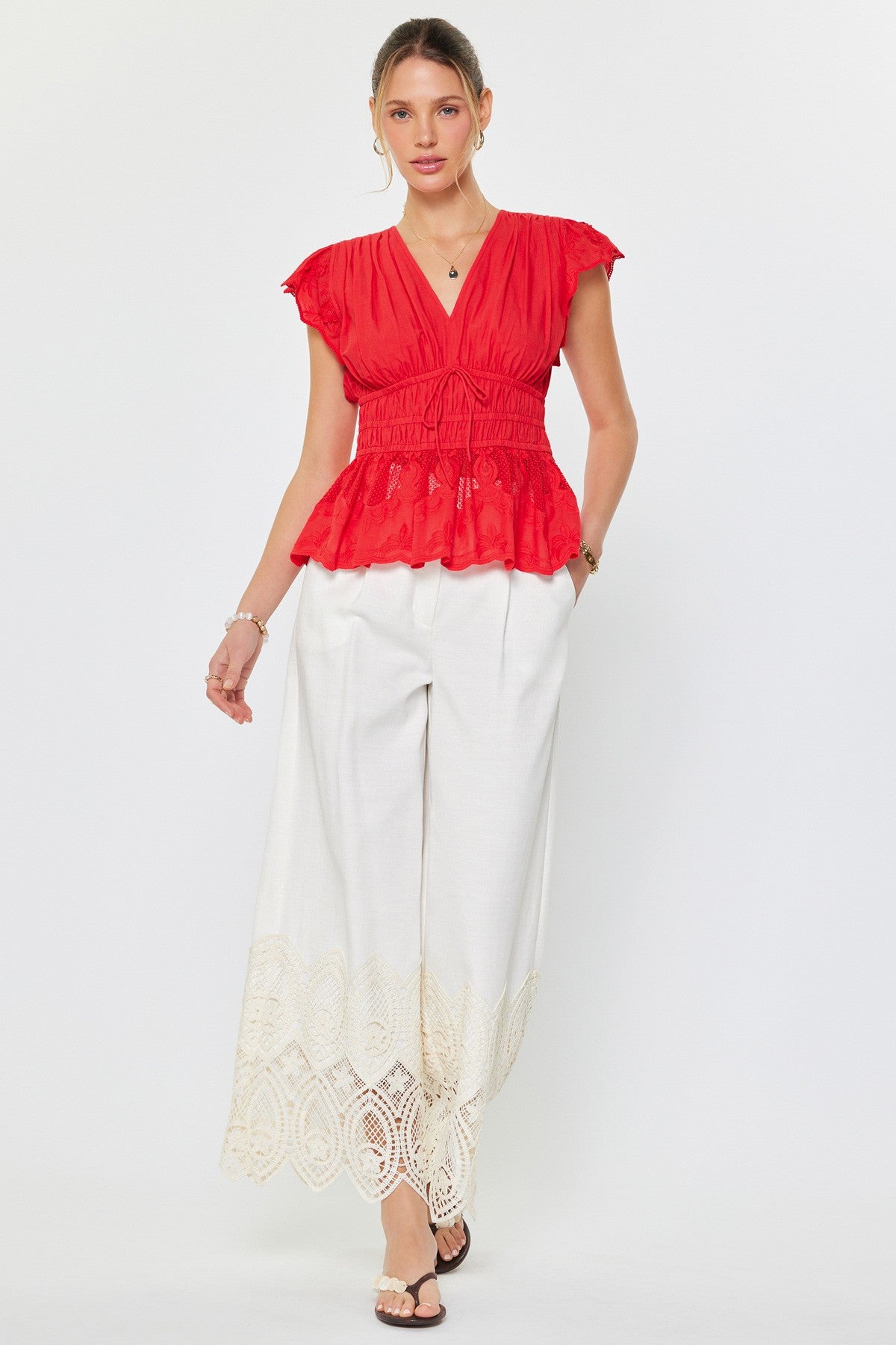 embroidered cotton peplum blouse with flutter sleeves