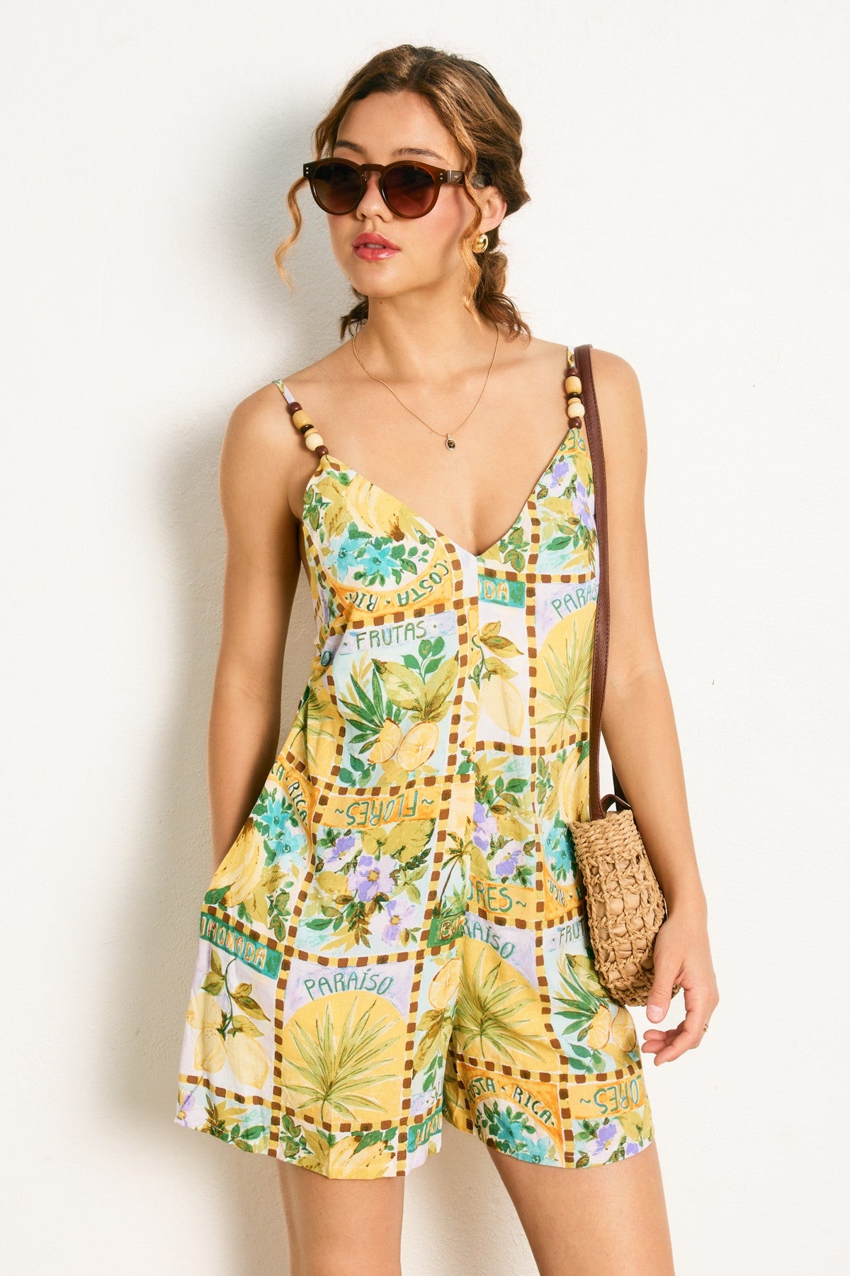 Vacation print open back romper with tie closure