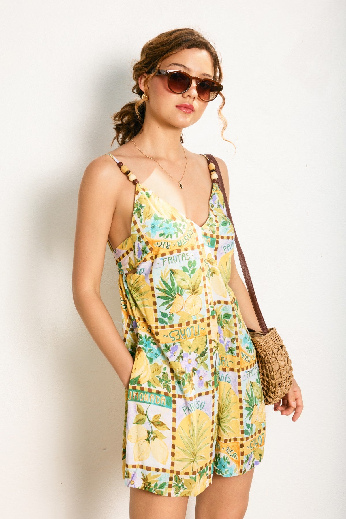 Vacation print open back romper with tie closure