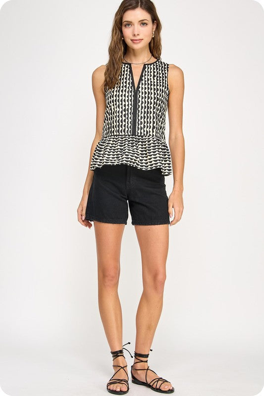sleeveless cotton poplin blouse with scallop geometric print, V-neck, contrast piping, and peplum hem