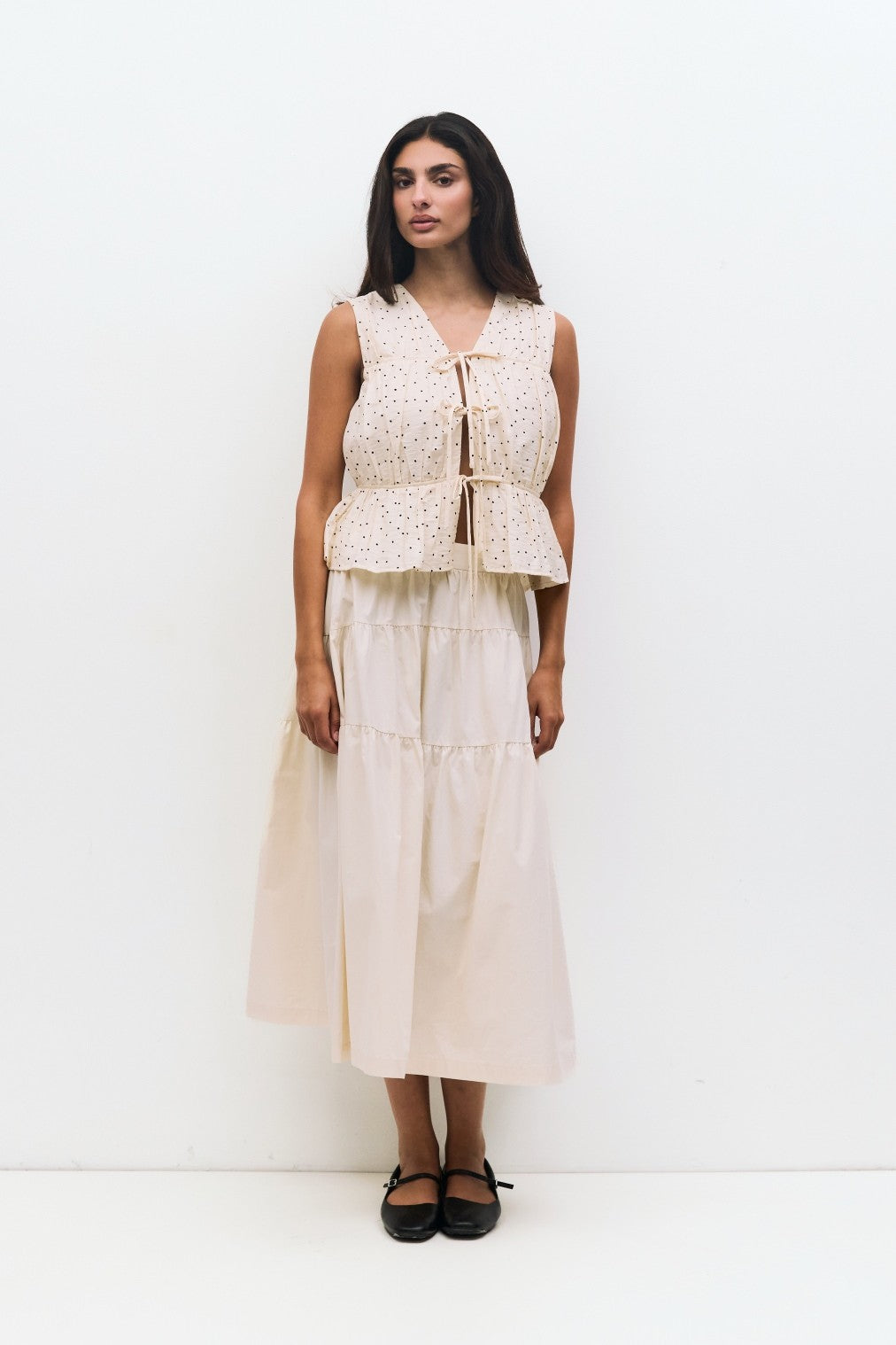 ightweight tiered V-neck blouse with front ties