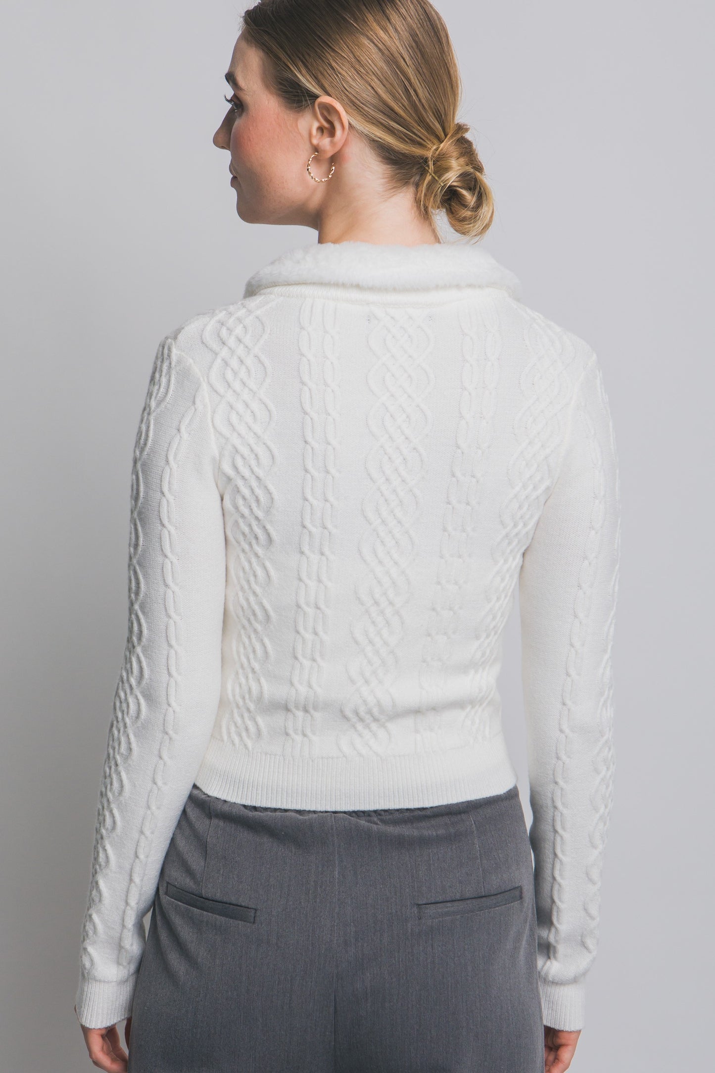 The Colette Faux-Fur Collared Cardigan adds vintage-inspired charm with its soft knit texture and plush faux-fur trim.