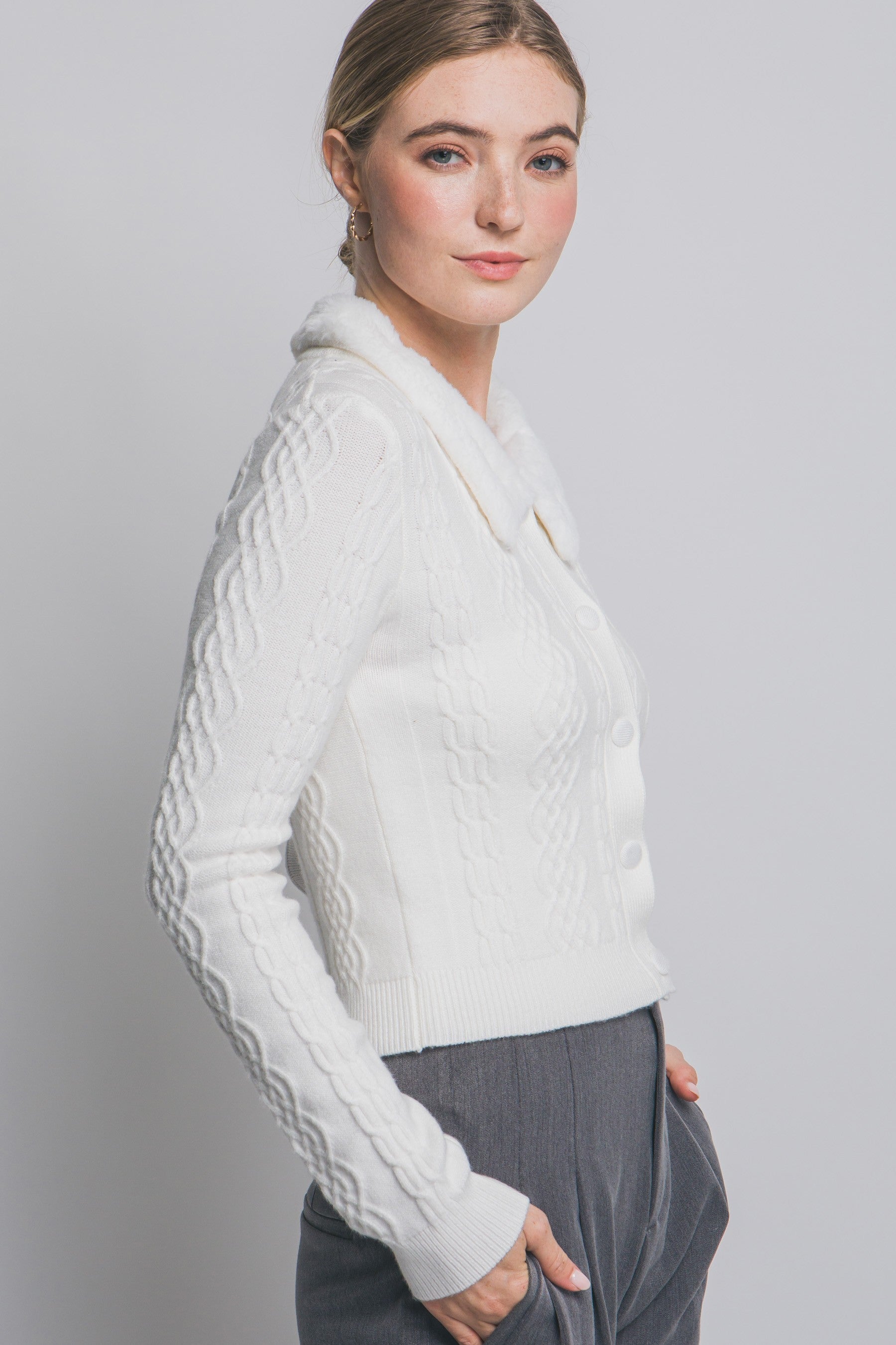 The Colette Faux-Fur Collared Cardigan adds vintage-inspired charm with its soft knit texture and plush faux-fur trim.