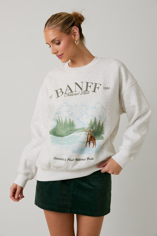 The Ainsley sweatshirt blends cozy fleece comfort with a classic crew neck design inspired by Banff National Park.