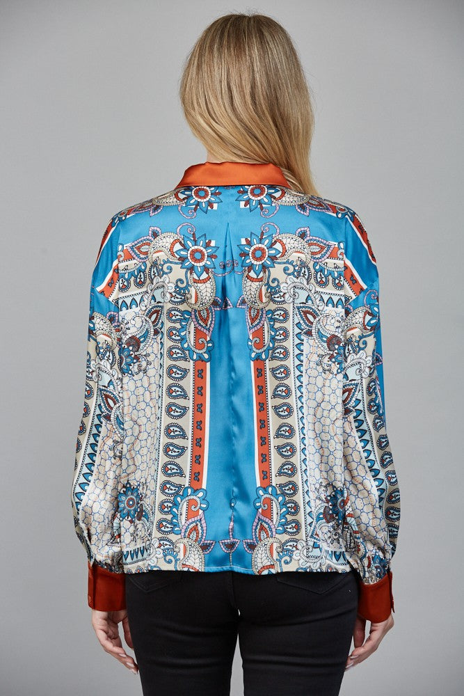Women’s long sleeve scarf-print button-down blouse with silky finish.