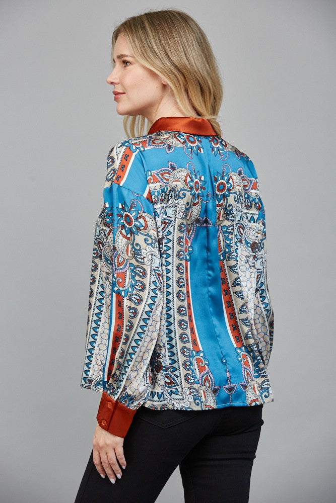 Women’s long sleeve scarf-print button-down blouse with silky finish.