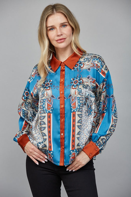 Women’s long sleeve scarf-print button-down blouse with silky finish.