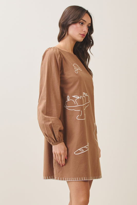 100% cotton embroidered mini dress featuring long volume sleeves, decorative whipstitch detailing, and a relaxed feminine silhouette.