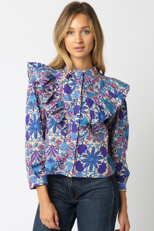 The Elowen Floral Ruffle Shirt blends effortless charm with timeless feminine details.