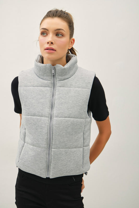 Lightweight yet warm, the Theresa puffer vest is the perfect layering essential for crisp-weather days.