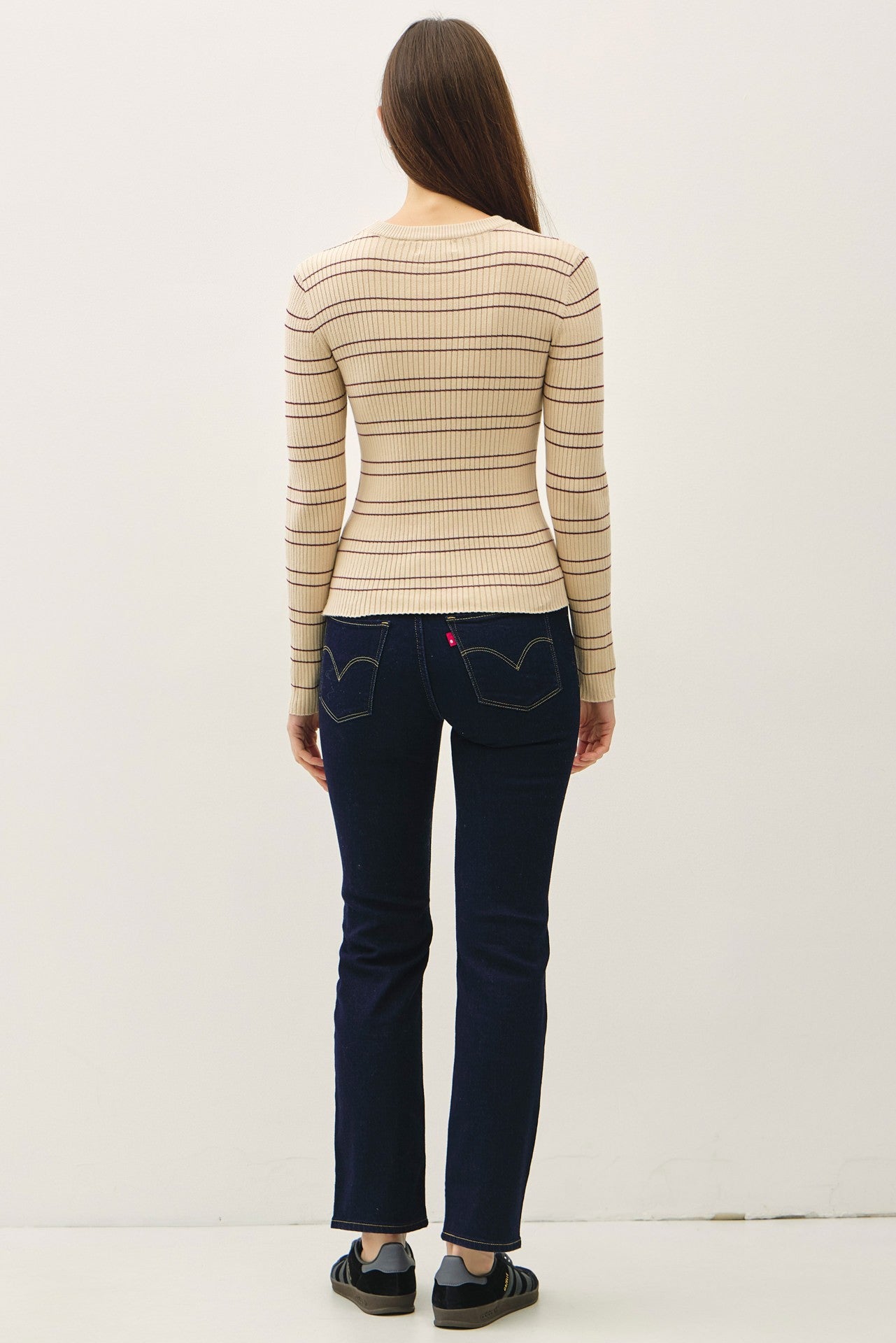 Classic and sporty, the Elowen sweater features timeless stripes in a slim, flattering fit.