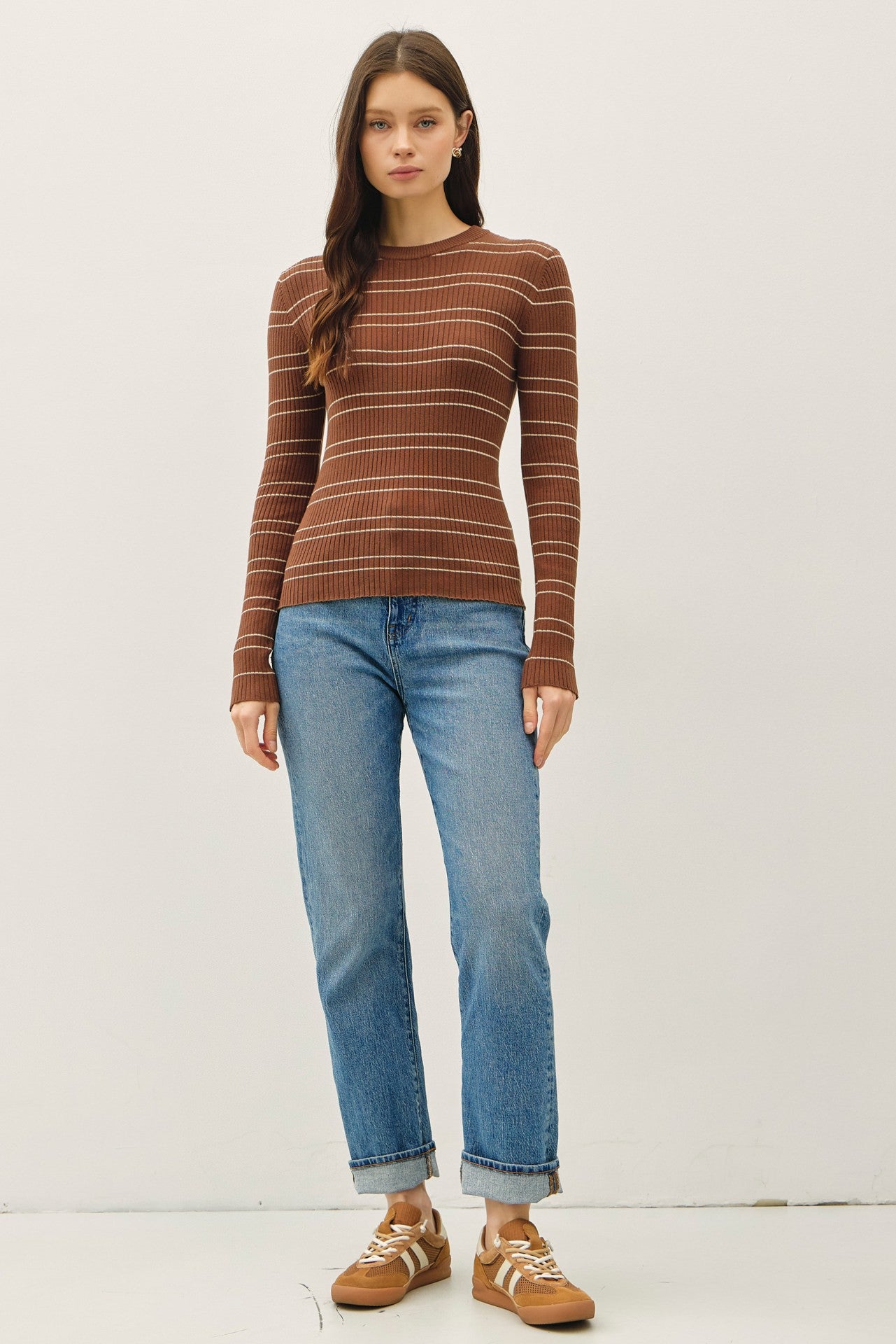 Classic and sporty, the Elowen sweater features timeless stripes in a slim, flattering fit.