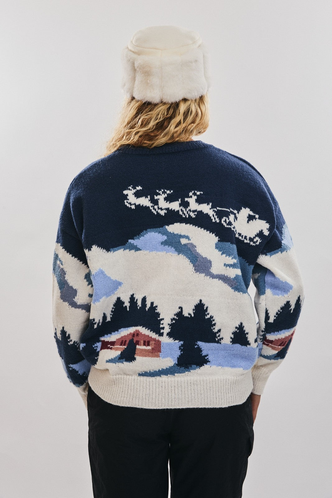 Bring the slopes to your style with this cozy Ski Village sweater — warm, playful, and perfect for winter layering.