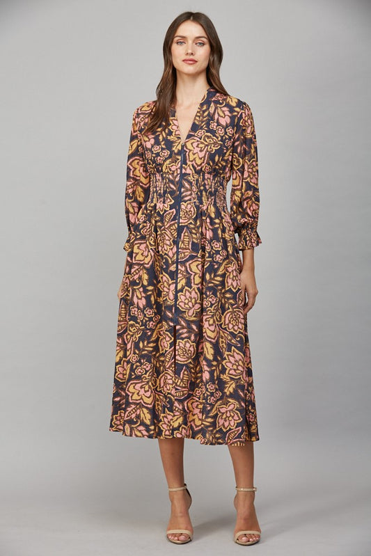 Floral print midi dress with gathered waist and front zip closure.