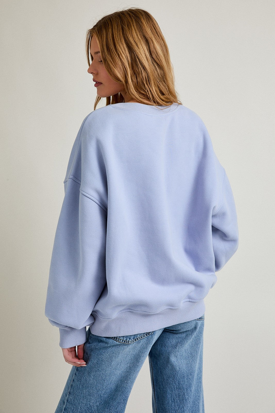Cozy up in wintry charm with the Alaska snowflake sweatshirt — soft, oversized, and perfect for laid-back days.