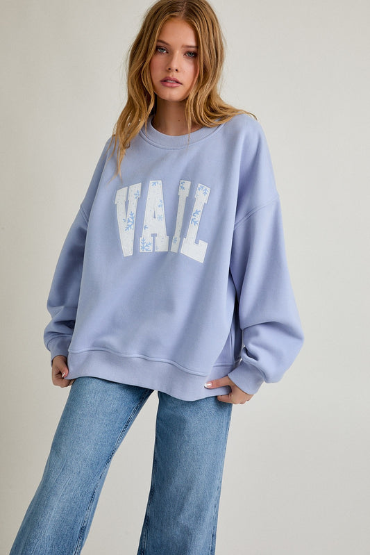 Cozy up in wintry charm with the Alaska snowflake sweatshirt — soft, oversized, and perfect for laid-back days.