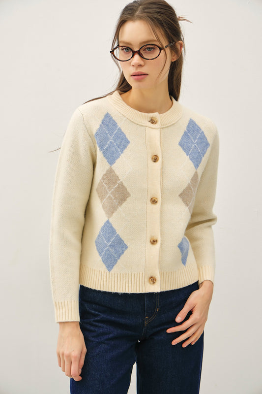 A timeless cardigan with a soft, cozy feel and elegant horn button detailing.