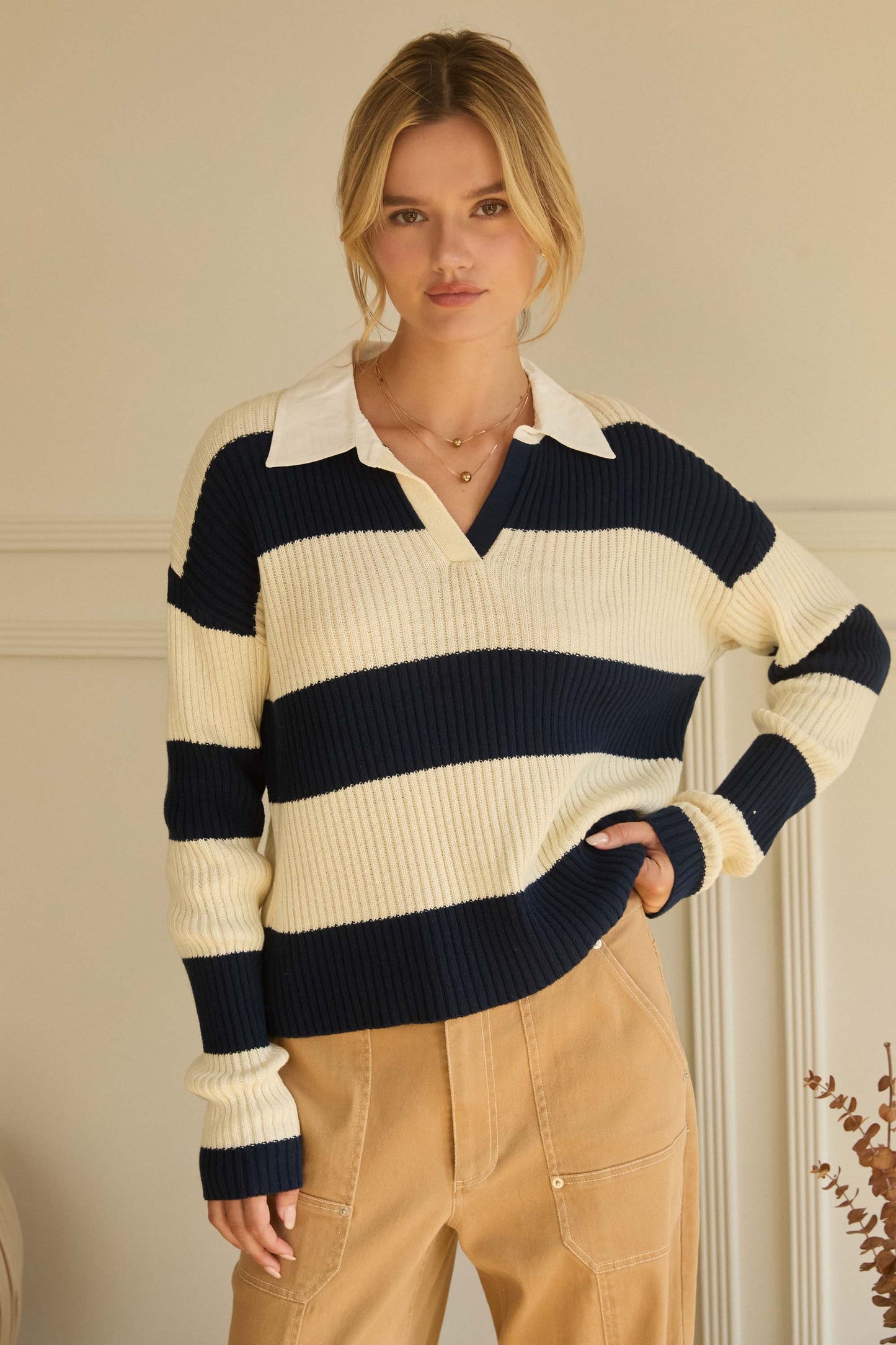 Timeless stripes meet modern comfort in this soft ribbed knit polo