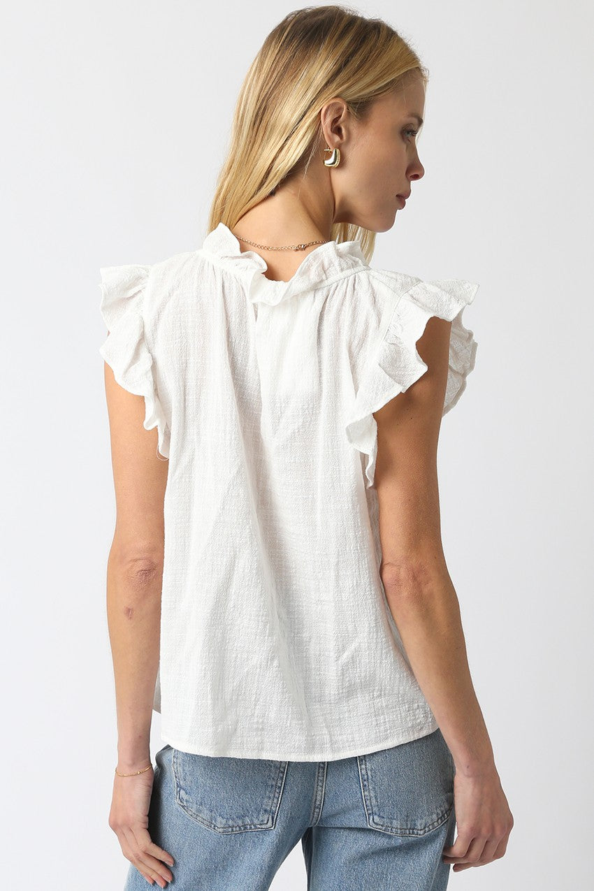 Women’s cotton blouse with ruffled cap sleeves