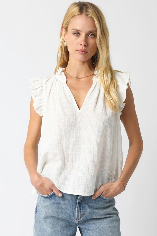 Women’s cotton blouse with ruffled cap sleeves