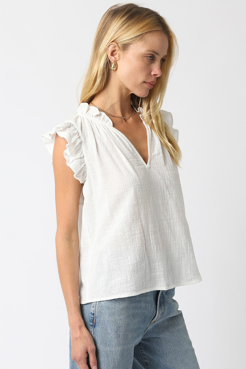 Women’s cotton blouse with ruffled cap sleeves